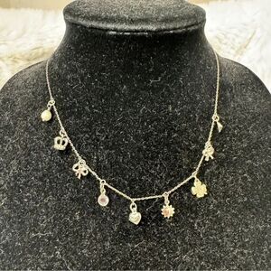 Juicy Couture Silver Hanging Different Charms Necklace